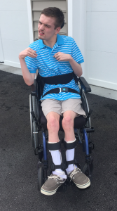 Blake uses dynamic seating on his wheelchair to encourage self propulsion.