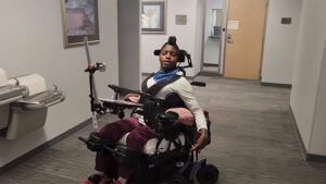 Naomi Drives Power Wheelchair with Dynamic Seating Assist